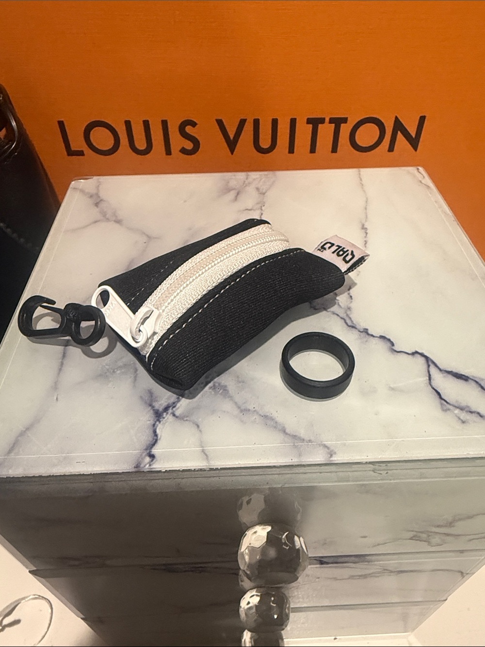 Black Qalo Ring with Zip Ring Pouch - size 5